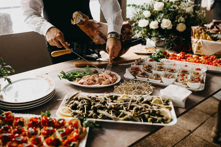 Close-up of traditional Spanish food being served at an event in Sotogrande, Spain